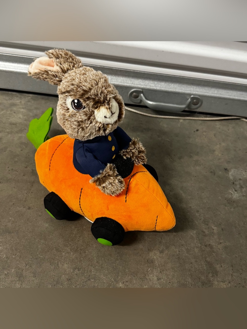 Animatronic Peter Rabbit Plush Bunny on Orange Carrot Holiday Décor